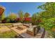 Backyard lounge space with ample seating and landscaping at 5662 Escamilla Rd, Las Vegas, NV 89135