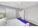 Bedroom featuring a bed, ensuite bathroom, and wood floors at 5662 Escamilla Rd, Las Vegas, NV 89135