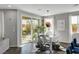Modern dining area with views of the backyard patio and modern decor at 5662 Escamilla Rd, Las Vegas, NV 89135