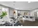 Dining area with bar seating that leads to a gourmet kitchen at 5662 Escamilla Rd, Las Vegas, NV 89135