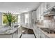 This kitchen features stainless steel appliances, granite countertops and an island sink at 5662 Escamilla Rd, Las Vegas, NV 89135