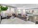 Open floor plan of a living room, dining area, and gourmet kitchen at 5662 Escamilla Rd, Las Vegas, NV 89135