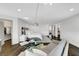 Bright main bedroom boasts hardwood floors, seating area and a spacious walk-in closet for ample storage at 5662 Escamilla Rd, Las Vegas, NV 89135