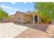 A well-kept backyard featuring a covered patio and low maintenance landscape at 5752 Shermer Ct, Las Vegas, NV 89120