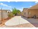 Spacious backyard features a large concrete area, low maintenance landscaping and brick trim at 5752 Shermer Ct, Las Vegas, NV 89120