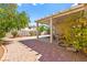 Backyard featuring a covered patio area and landscaping at 5752 Shermer Ct, Las Vegas, NV 89120