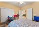 Bedroom featuring a closet, exercise bike and a ceiling fan at 5752 Shermer Ct, Las Vegas, NV 89120