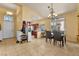 Open dining space with views to the kitchen and ample room for entertaining at 5752 Shermer Ct, Las Vegas, NV 89120