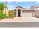 Charming single-story home featuring desert landscaping and a welcoming entrance at 5752 Shermer Ct, Las Vegas, NV 89120