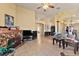 Bright living space that includes tile flooring and a decorative fireplace feature at 5752 Shermer Ct, Las Vegas, NV 89120