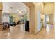 Comfortable living area featuring neutral walls and a seamless flow into adjacent rooms at 5752 Shermer Ct, Las Vegas, NV 89120