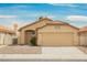 Charming single-story home features a two-car garage and desert landscaping at 5828 Red Gull St, Las Vegas, NV 89149