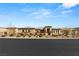 Charming single-story home with desert landscaping and a neatly maintained front yard at 5860 Noah Springs Ct, Las Vegas, NV 89149