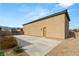 Exterior shot of oversized garage with elongated driveway on a sunny day at 5860 Noah Springs Ct, Las Vegas, NV 89149