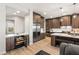 Chef's kitchen featuring a wine fridge, modern appliances, and stylish cabinetry at 5860 Noah Springs Ct, Las Vegas, NV 89149
