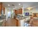 Beautiful kitchen featuring stainless steel appliances and a breakfast bar that connects to the living area at 6128 Forest Pony Ave, Las Vegas, NV 89122