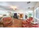 Bright living room with hardwood floors and comfortable seating at 6128 Forest Pony Ave, Las Vegas, NV 89122