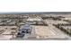 Aerial view showcasing a modern home and a large adjacent building lot at 6265 Iron Mountain Rd, Las Vegas, NV 89131