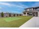 Lush backyard featuring a putting green for golf enthusiasts and a beautifully landscaped yard at 6265 Iron Mountain Rd, Las Vegas, NV 89131