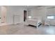 White bedroom featuring a minimalist design and neutral colors at 6265 Iron Mountain Rd, Las Vegas, NV 89131