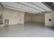 Spacious garage with epoxy flooring and multiple access doors for convenience at 6265 Iron Mountain Rd, Las Vegas, NV 89131