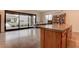Contemporary kitchen featuring a sink in the island and sliding doors that open to the outside at 6265 Iron Mountain Rd, Las Vegas, NV 89131
