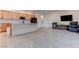 Bright kitchenette features natural wood cabinets, stainless steel appliances, and ample storage at 6265 Iron Mountain Rd, Las Vegas, NV 89131