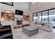 Bright living room with hardwood floors, fireplace, and outdoor views at 6265 Iron Mountain Rd, Las Vegas, NV 89131