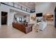 Open living room with hardwood floors, built-in shelving, and comfortable seating at 6265 Iron Mountain Rd, Las Vegas, NV 89131