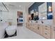 This main bathroom features a soaking tub, dual sinks, and modern fixtures at 6265 Iron Mountain Rd, Las Vegas, NV 89131