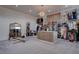 Bright walk-in closet with custom storage, ample shelving, and a full length mirror at 6265 Iron Mountain Rd, Las Vegas, NV 89131