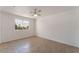 Spacious bedroom with tile floors and a bright window at 6808 Elm Creek Dr # 203, Las Vegas, NV 89108