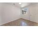 Bedroom featuring tile flooring and a window allowing natural light at 6808 Elm Creek Dr # 203, Las Vegas, NV 89108