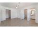 Spacious bedroom with a ceiling fan, closet, and a bathroom at 6808 Elm Creek Dr # 203, Las Vegas, NV 89108