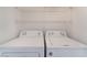 Washer and dryer hookups with overhead wire shelving at 6808 Elm Creek Dr # 203, Las Vegas, NV 89108
