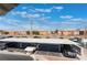 View of community parking and carports from upper patio at 6808 Elm Creek Dr # 203, Las Vegas, NV 89108