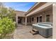 Enjoy the covered back patio with a built-in hot tub, ideal for relaxing and entertaining outdoors at 7288 Olsen Farm St, Las Vegas, NV 89131