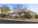 Charming home featuring mature trees and desert landscaping at 7288 Olsen Farm St, Las Vegas, NV 89131