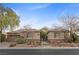 Charming single-story home featuring desert landscaping and a two-car garage at 7288 Olsen Farm St, Las Vegas, NV 89131