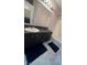 Well-lit bathroom featuring a shower and tub, along with a modern sink and vanity at 7904 Greycrest Ct # 104, Las Vegas, NV 89145