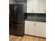 Modern kitchen featuring stainless steel appliances and white cabinets, blending style and functionality at 7904 Greycrest Ct # 104, Las Vegas, NV 89145