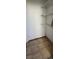 A pantry with white wire shelving and tile flooring provides convenient storage space at 7904 Greycrest Ct # 104, Las Vegas, NV 89145