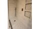 Elegant shower with decorative niches and modern hardware at 7904 Greycrest Ct # 104, Las Vegas, NV 89145