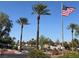 Street view with community landscaping and palm trees at 7904 Greycrest Ct # 104, Las Vegas, NV 89145
