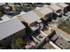 Aerial view highlights the backyard with a patio, spiral staircase, and well-manicured landscaping at 8008 Draco Cir # 201, Las Vegas, NV 89128