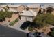 Attractive home with a two-car garage, lush landscaping, and ample parking space at 8008 Draco Cir # 201, Las Vegas, NV 89128