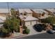 This home boasts a two-car garage, low-maintenance landscaping, and a serene desert backdrop at 8008 Draco Cir # 201, Las Vegas, NV 89128