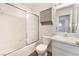 Bathroom featuring a shower, toilet, vanity with sink, and a mirrored medicine cabinet at 8113 Dolphin Landing Dr, Las Vegas, NV 89128