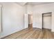 Bright bedroom with a ceiling fan, closet, and an open doorway at 8113 Dolphin Landing Dr, Las Vegas, NV 89128