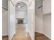 View of a closet that looks into the living room with a fireplace at 8113 Dolphin Landing Dr, Las Vegas, NV 89128
